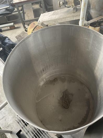 Used Twin 100 gallon S.S. Tanks w/ pumps on mezzanine