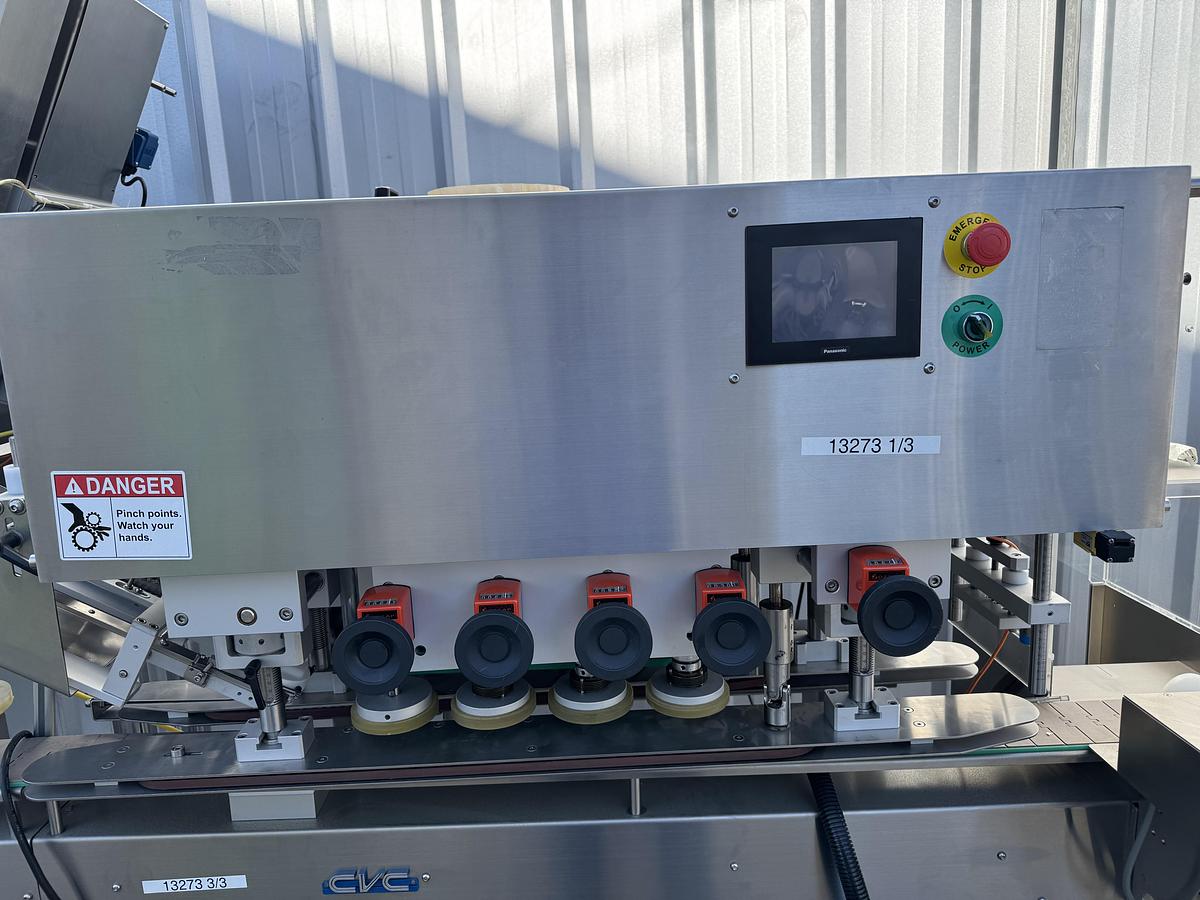 Used CVC 8-spindle Capper w/ Elevator & Conveyor
