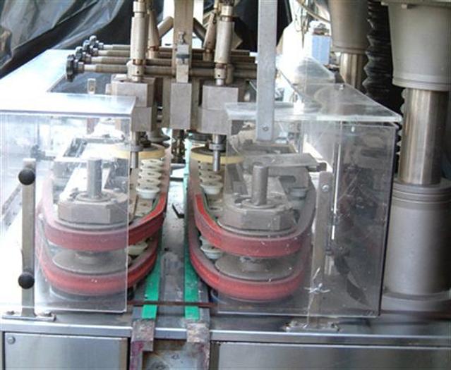 Used Unicap 8 spindle Capper