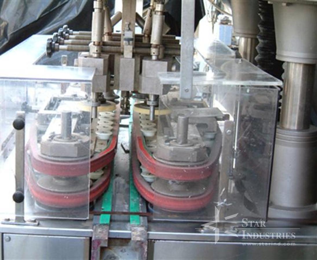 Used Unicap 8 spindle Capper