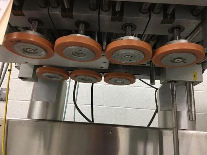 Used D.L.-Tech 8-spindle Capper