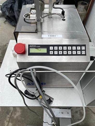 Used Azco Vertical Pouch Dispenser