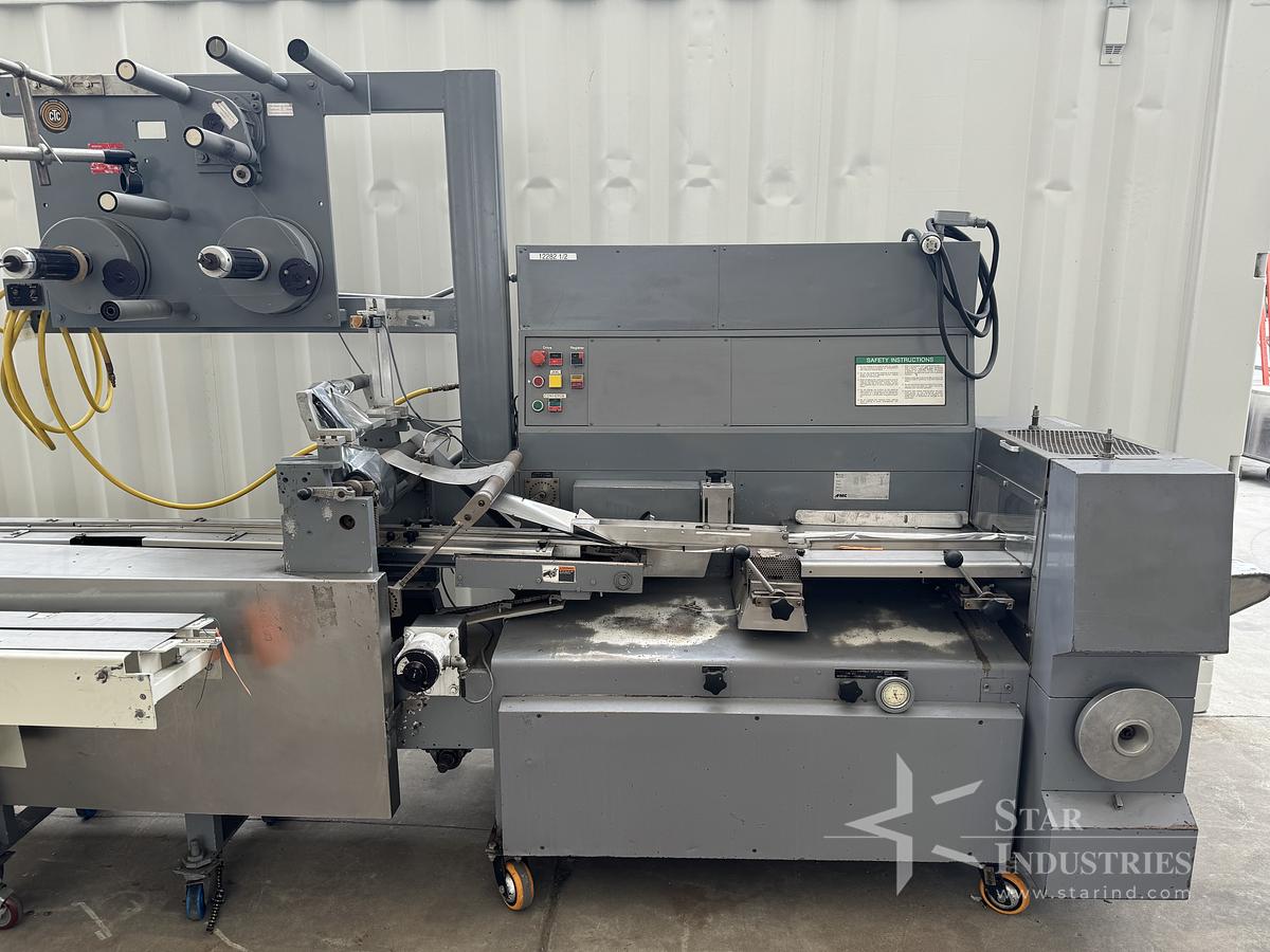 Used FMC Model WA-520 Flow-Wrapper w/ Conveyor