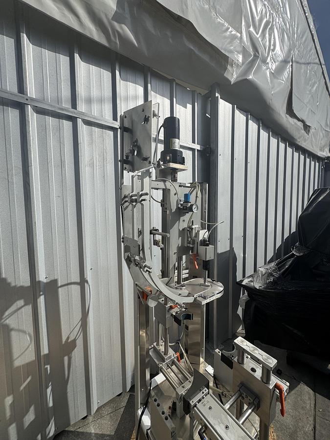 Used Chuck Capper w/ Elevator