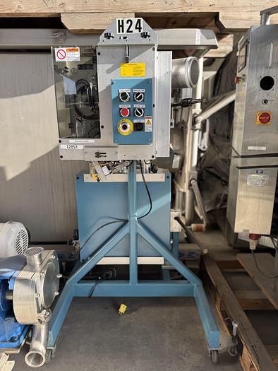 Used GeorgeDessicant Inserter