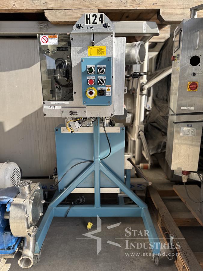 Used GeorgeDessicant Inserter