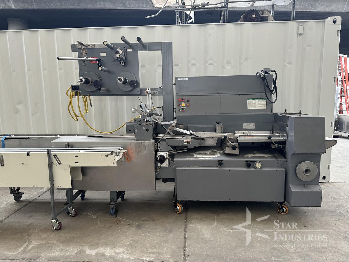 Used FMC Model WA-520 Flow-Wrapper w/ Conveyor