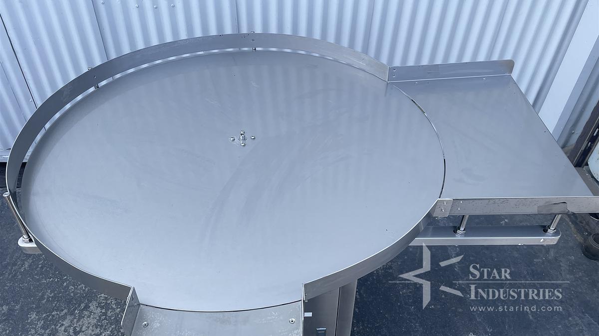 Used Used 48'' Stainless Steel Accumulating Table w/ side discharge, speed control. 115V, 15 amp, 1 phase