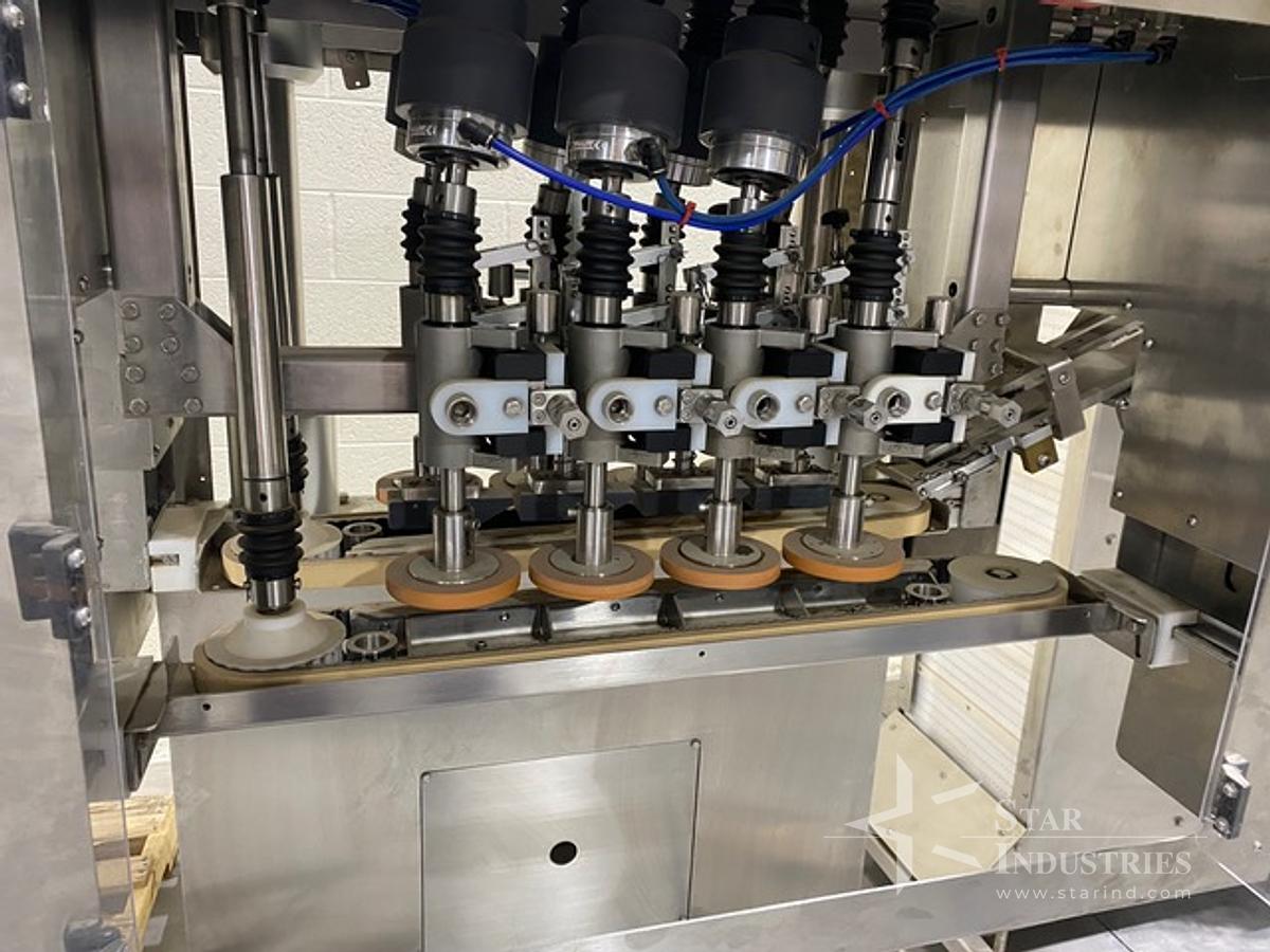 Used Acasi Spindle Capper TCAP-8-W, with elevator