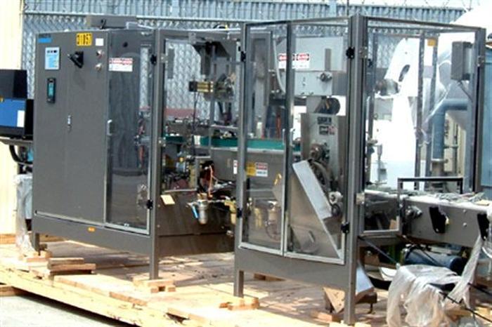 Used Roberts 450A tray packer w/ Nordson 3500V