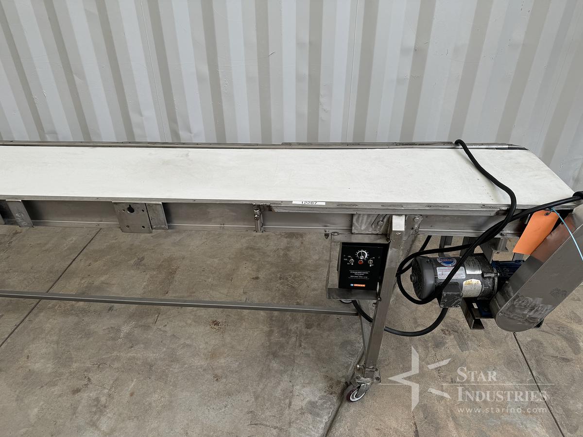 Used Conveyor, s.s. frame, 128" x 16" wide, variable speed, cloth belt, 110V