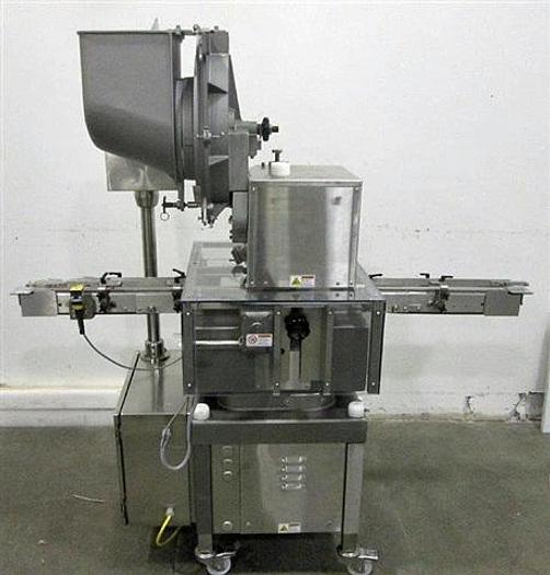 Used Genesis NPW-500 West Crimp Capper w/ Accum. Tables