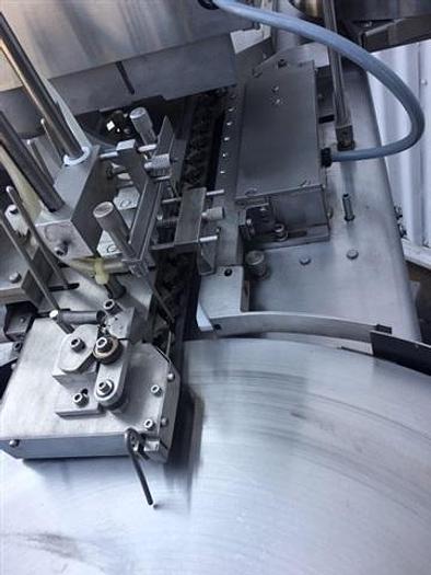 Used Active-Pak APA-1000 Dessicant Inserter