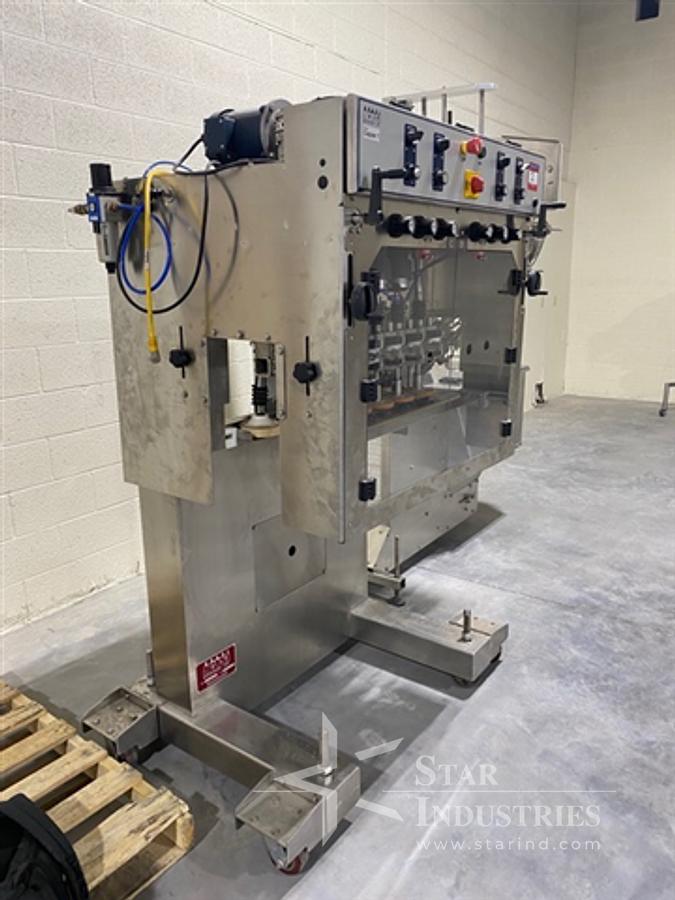 Used Acasi Spindle Capper TCAP-8-W, with elevator