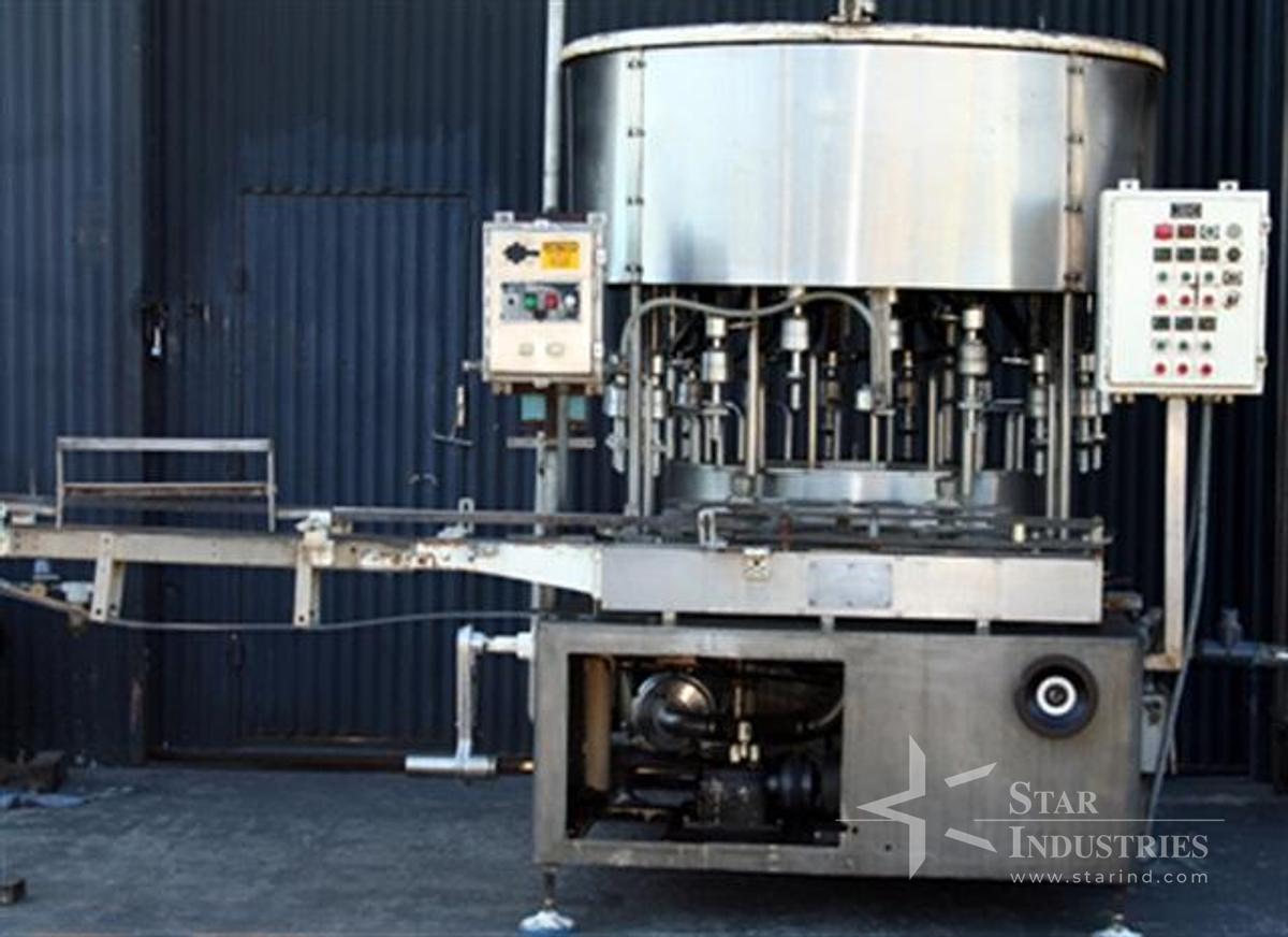 Used U.S. Rotary Gravity Filler, 18 heads for gallons