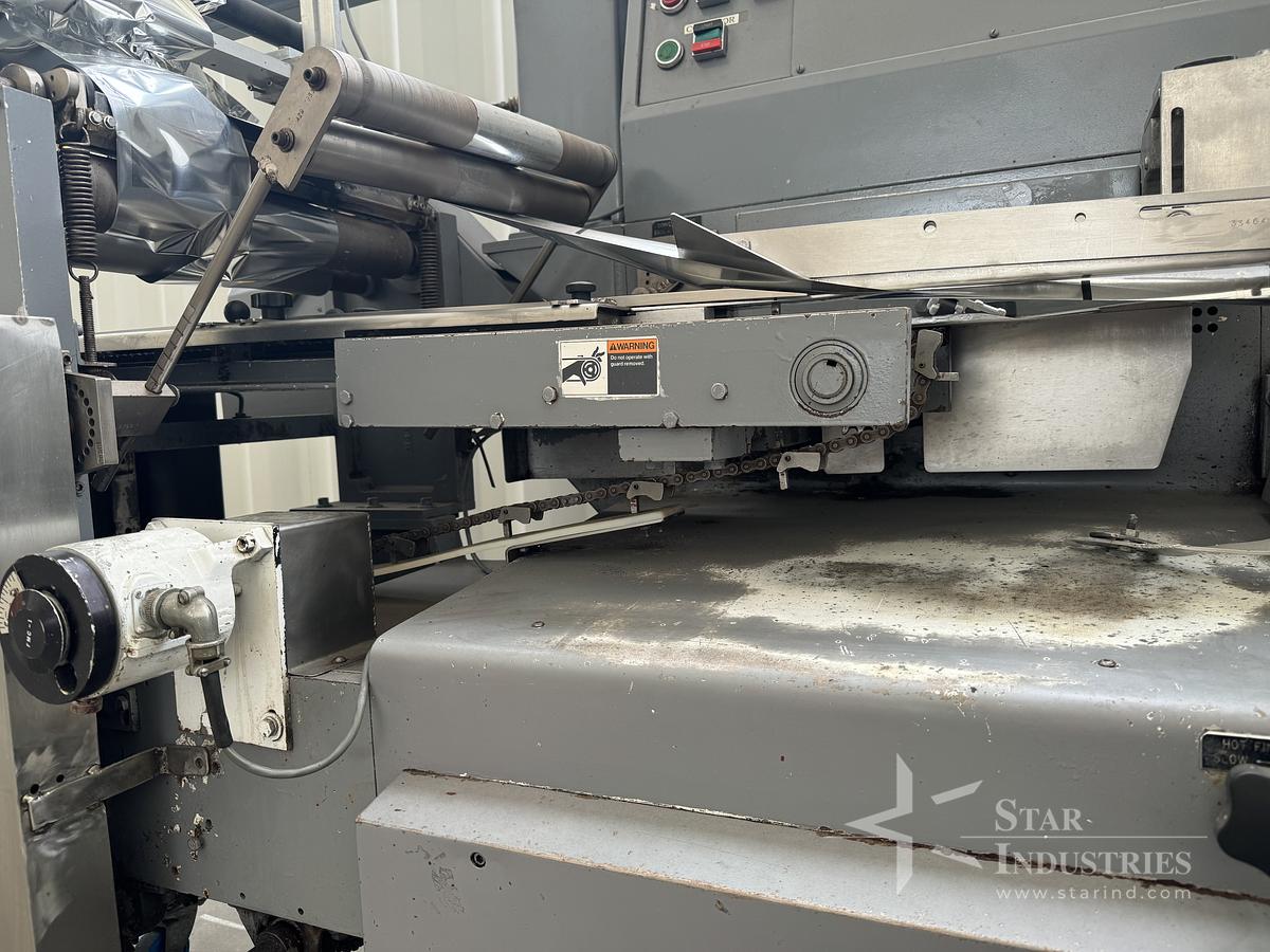 Used FMC Model WA-520 Flow-Wrapper w/ Conveyor