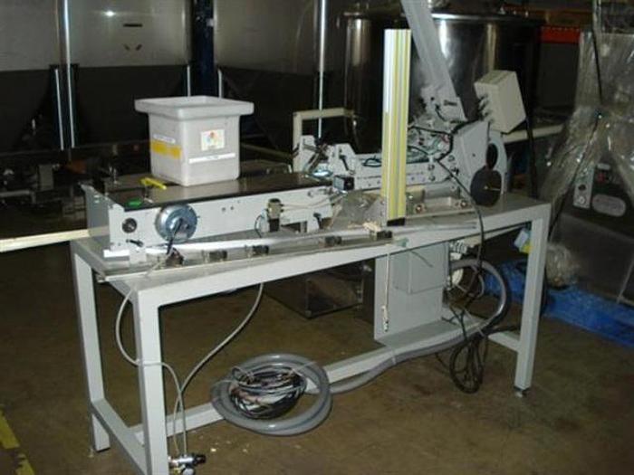 Used Longford Coupon Feeder, model C700-3-12FSM