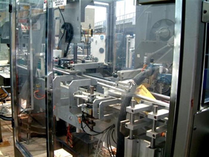 Used Roberts 450A tray packer w/ Nordson 3500V