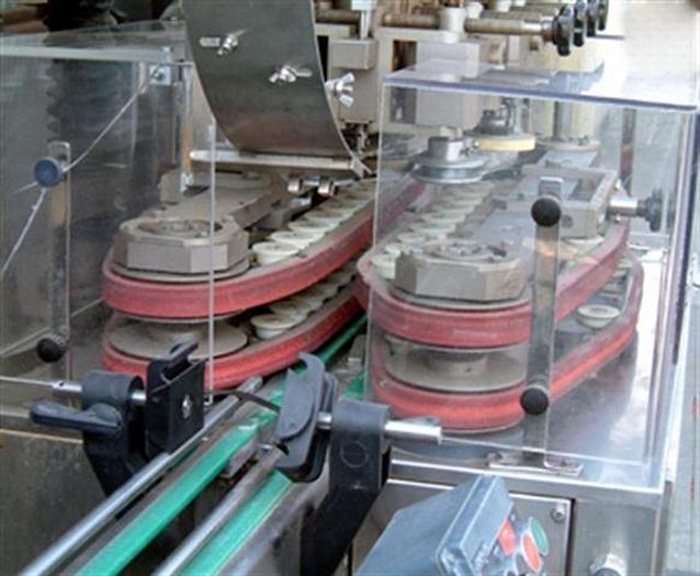 Used Unicap 8 spindle Capper