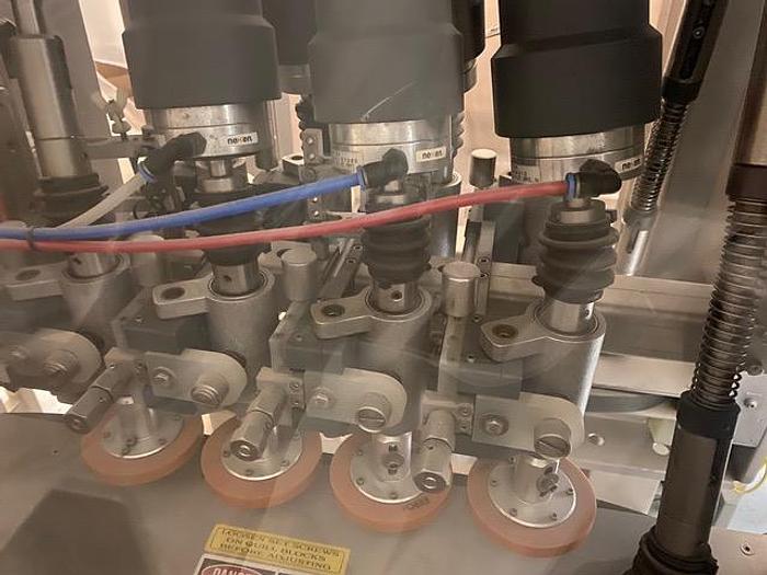 Used Pack-West Capper, Model Centurion 200, with 8' x 2' Stainless Steel Cap Elevator