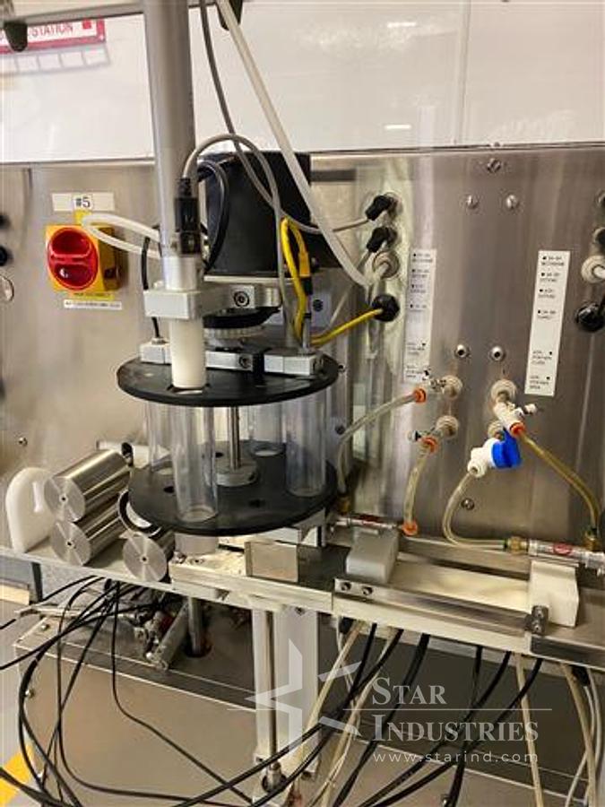 Used Equipment Express In-line 4-head time/pressure Filler
