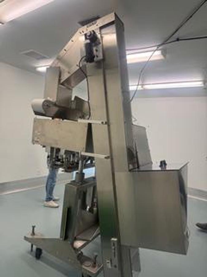 Used Sure Kap Inline Capper with Elevator