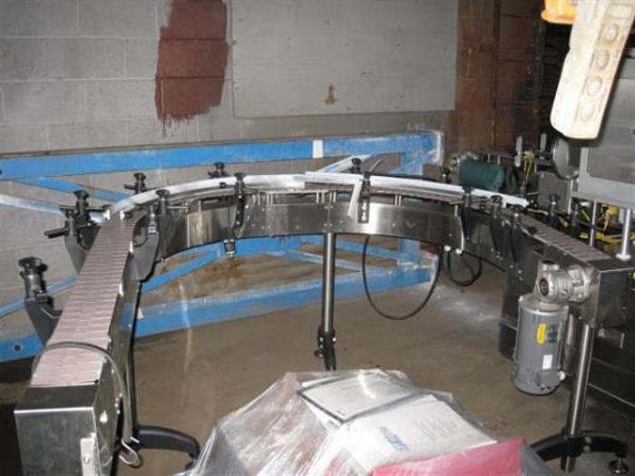 Used 4.5" x 12',  180 Degree Aesus Slat Conveyor