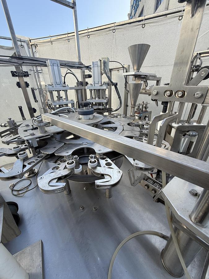 Used FILLER AND SEALER MACHINE