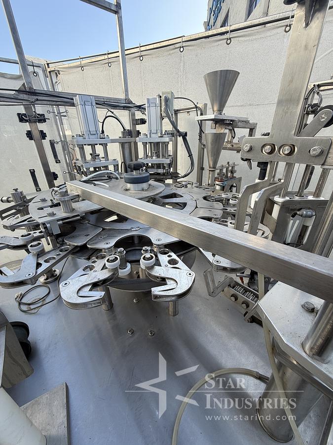 Used FILLER AND SEALER MACHINE