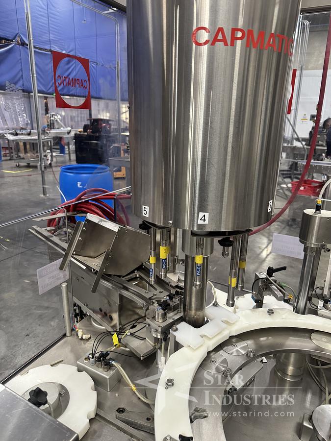 Used Capmatic Model Rebel Monoblock Capper for pumps, with multiple change parts