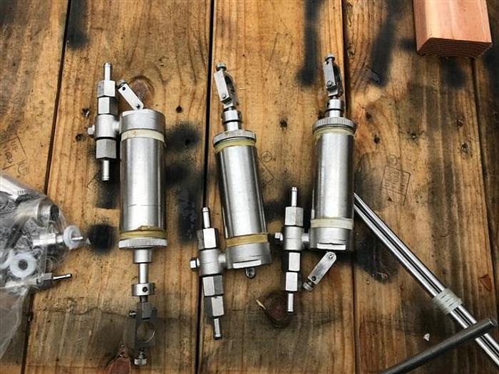 Used Filamatic Three Head Piston Filler With Conveyor