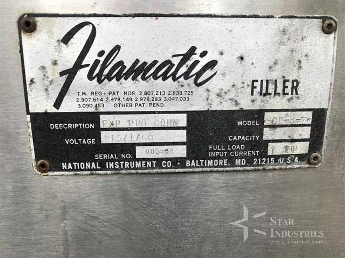 Used Filamatic Four Head Piston Filler With Conveyor