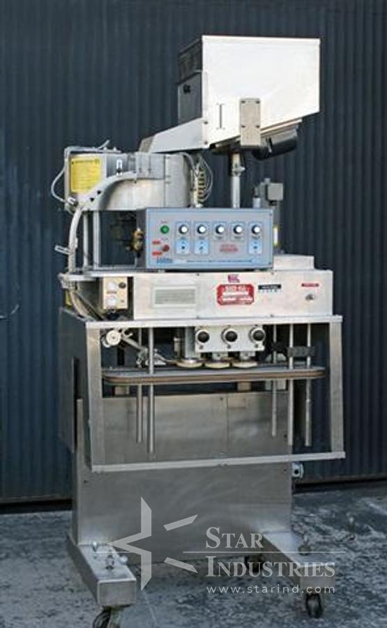 Used Kaps-All A6 6-spindle Capper