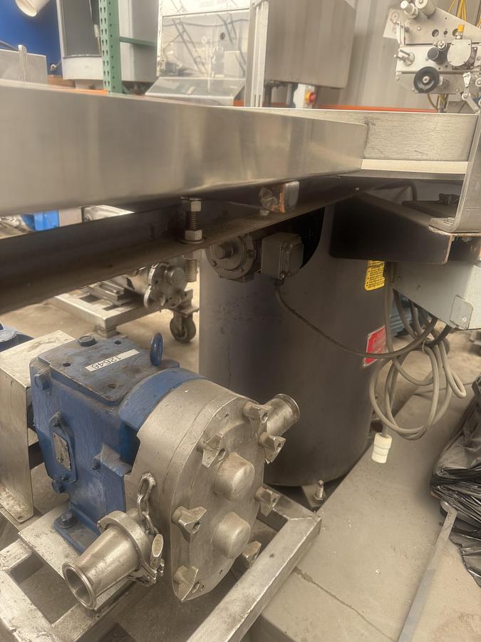 Used 48'' KapsAll variable speed S.S. Accumulation Table