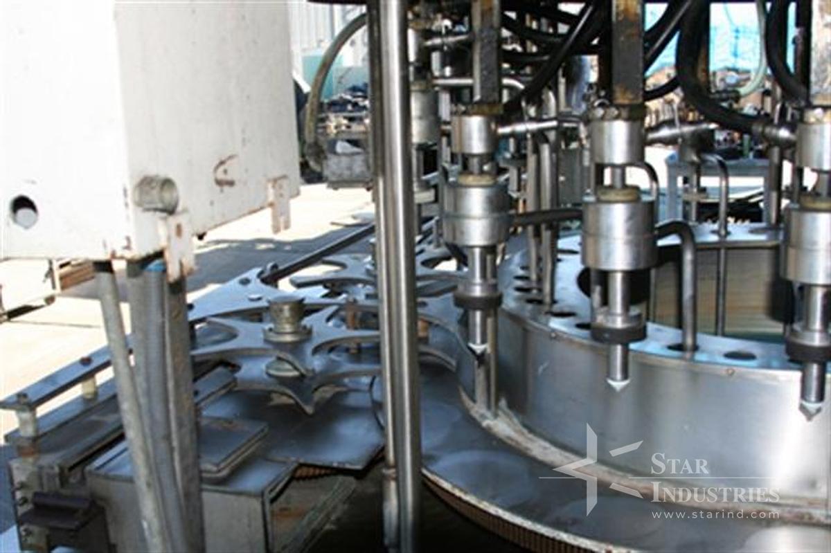 Used U.S. Rotary Gravity Filler, 18 heads for gallons