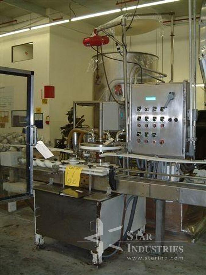 Used MRM 2 head 16 oz VersaFil Rotary Filler w/ 200 gal feed tank & 3 Waukesha Pumps