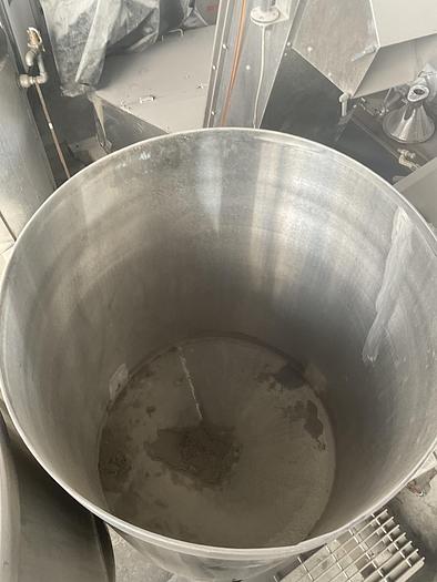 Used Twin 100 gallon S.S. Tanks w/ pumps on mezzanine