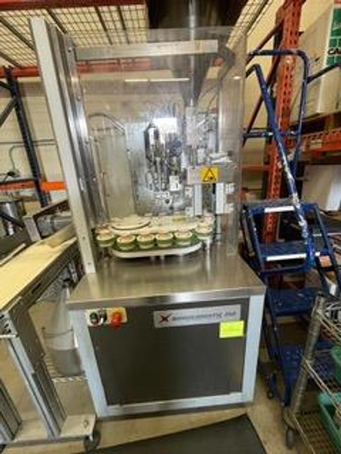 Used Norden Automatic tube filling & hot air sealing