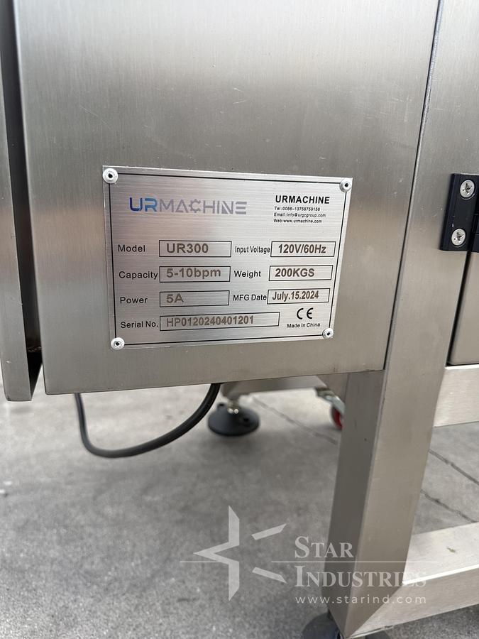 Used UR Machine UR300 Bag Filler, rated 5-10 per minute