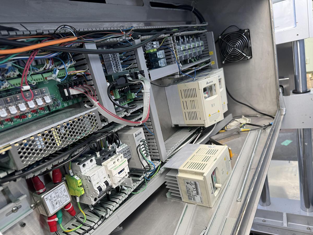 Used CVC 8-spindle Capper w/ Elevator & Conveyor