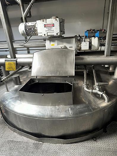 Used Stainless Steel 6,000 Gallon Jacketed & Double Motion Agitated Tank with scraper agitation and center agitation with turbine blade paddles