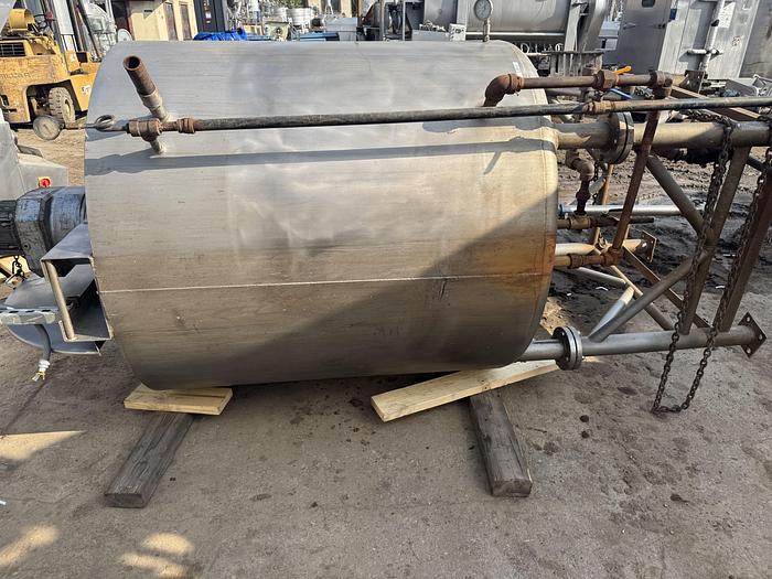 Used Tank, 500-Gallon, Stainless Steel, Scrape Agitation, JacketedMetal Craft 500-gallon stainless steel full jacketed and scrape agitated tank, constructed of 304 stainless steel. Measures 56" diameter x 58" straight side with flat top and dish bottom. Set up for side and bottom scrapers. Driven by a top-mounted drive through a gear reducer. 7.5 HP motor, 1755 RPM, 230/460V, 3/60Hz, with a gear reducer output of 40 RPM. Vessel is mounted on 4 stainless steel legs and features a 3" diameter center bottom outlet. Jacket Design pressure: 100 PSI, design temperature: 300°F. Last used in cosmetics industry.