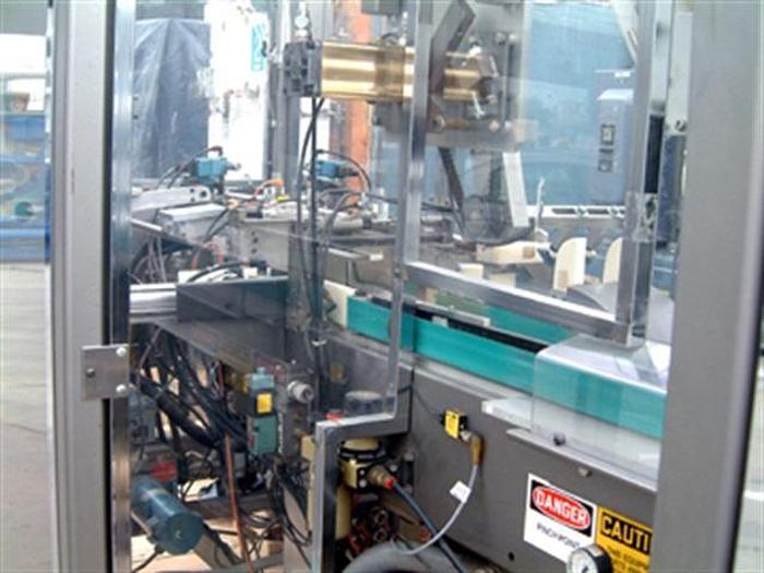 Used Roberts 450A Tray Packer w/ Nordson 2302