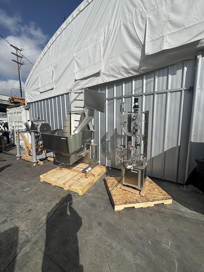 Used Chuck Capper w/ Elevator