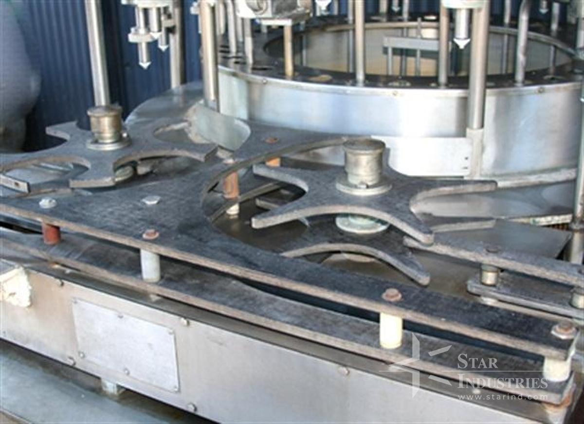 Used U.S. Rotary Gravity Filler, 18 heads for gallons