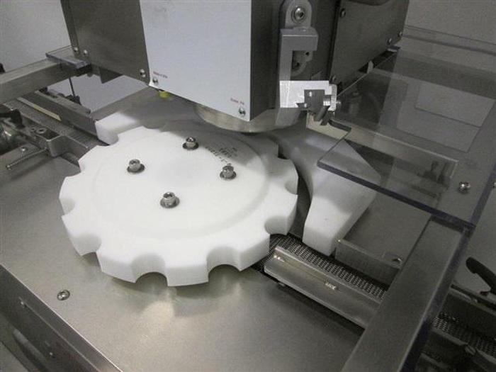 Used Genesis NPW-500 West Crimp Capper w/ Accum. Tables