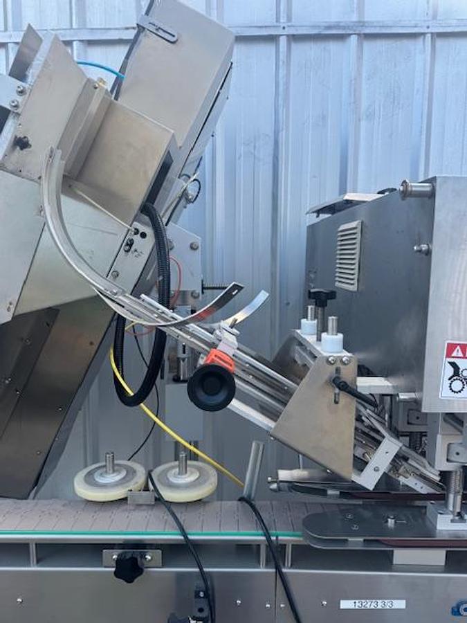 Used CVC 8-spindle Capper w/ Elevator & Conveyor