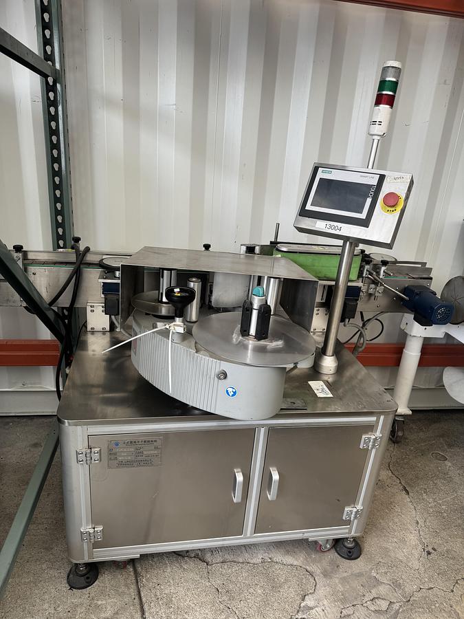 Used Labeler for round bottles, Model BLM