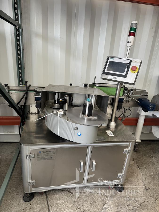 Used Labeler for round bottles, Model BLM