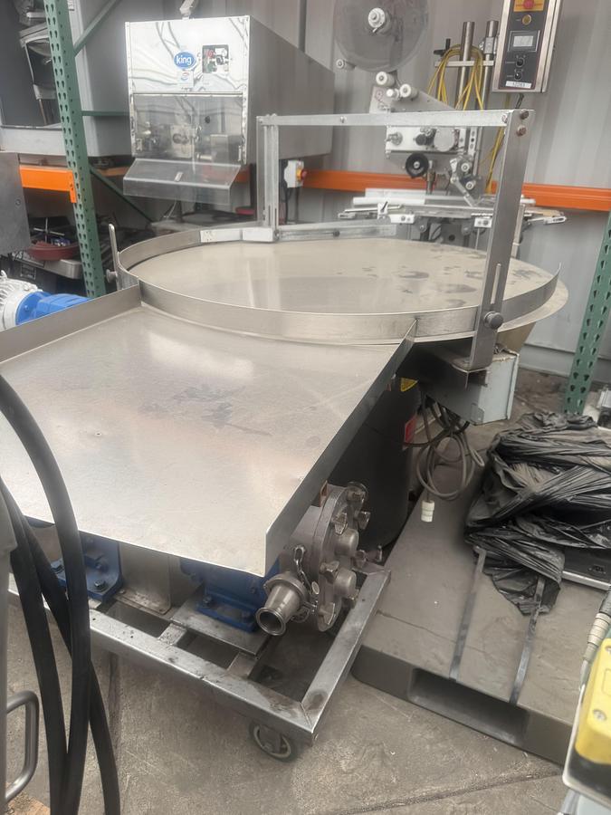 Used 48'' KapsAll variable speed S.S. Accumulation Table